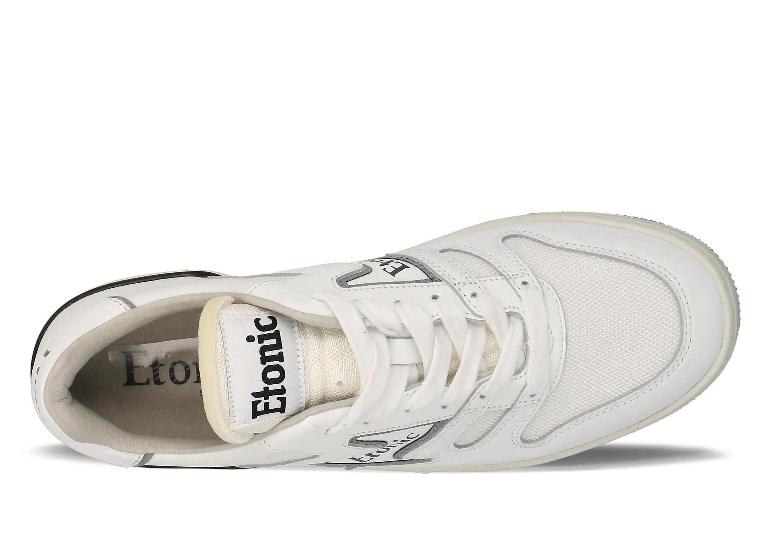 Etonic B481 sneakers in white leather, white mesh and black details with white midsole and honey bottom outsole.